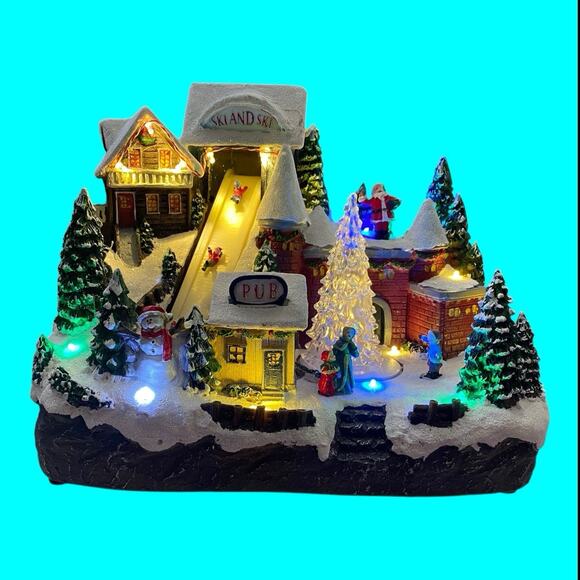Gerson Alpine Village Christmas Castle Musical Revolving Tree Skiers Lighted - Picture 2 of 11
